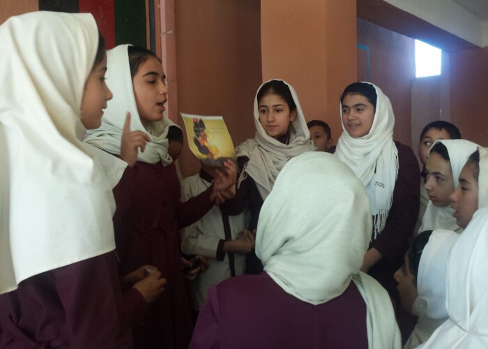 Female Afghan students making a presentation