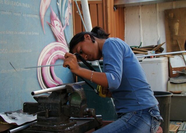 Woman at Palabra's antenna building workshop in Oaxaca, Mexico