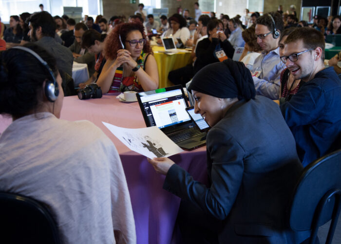Participants in a breakout session at the 14th Conectas Human Rights Colloquium