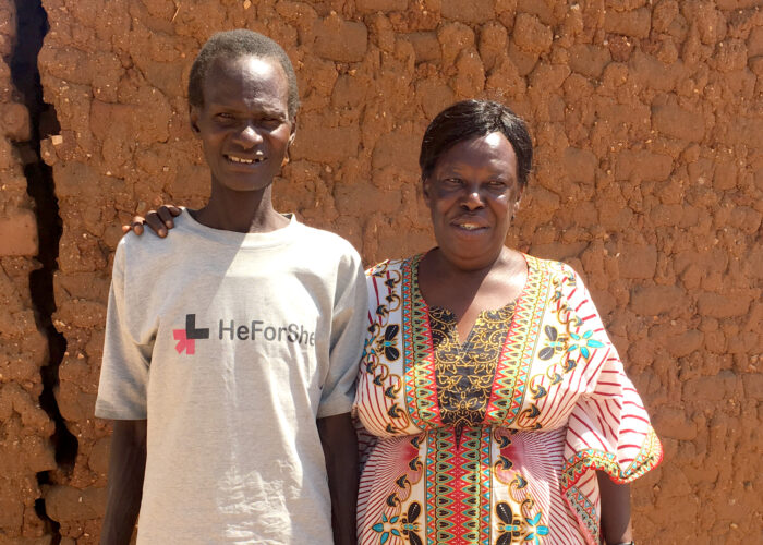 AWARE Executive Director of grantee posing with a Change Agent