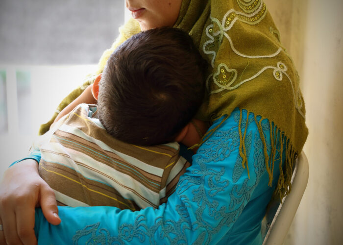 Syrian Refugee mother and child in Europe