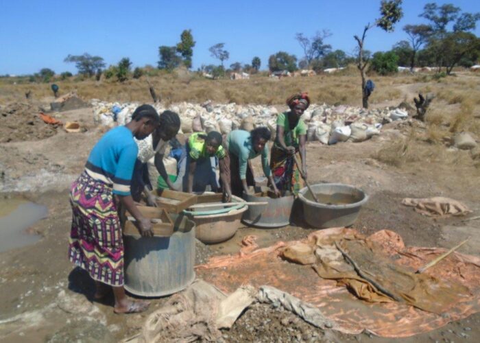 Women sorting and washing minerals Kansonga, DRC