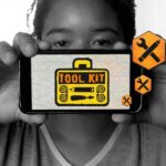 Woman holding toolkit image