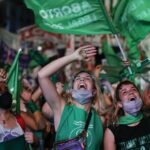 Young feminists in Argentina celebrating legalization of abortion