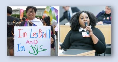 Two LBQ women activists side to side, one speaking into a microphone and one holding a sign