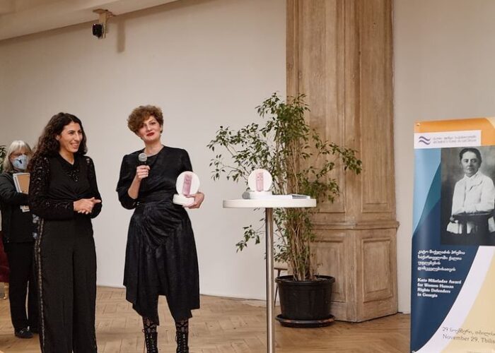 Presenters handing out awards at a Women's Fund in Georgia event
