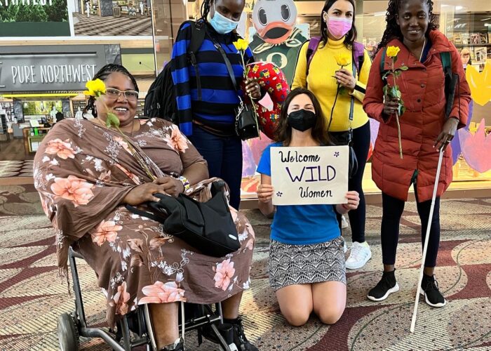 2016 WILD conference attendees welcoming new arrivals