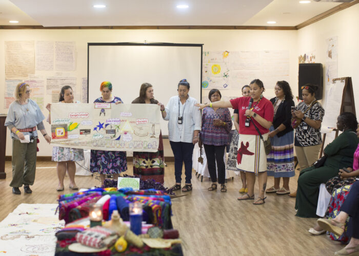 Group of Indigenous women giving a presentation at the 10th Anniversary of the Global Indigenous Women's Leadership School