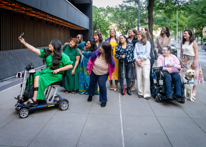 WEI participants taking a group selfie outside the CoSP conference