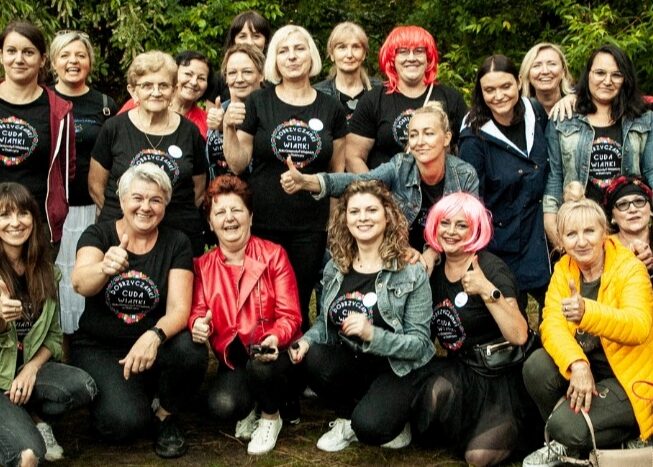 FemFund members gathered to celebrate Feminist Day giving a thumbs up to the camera