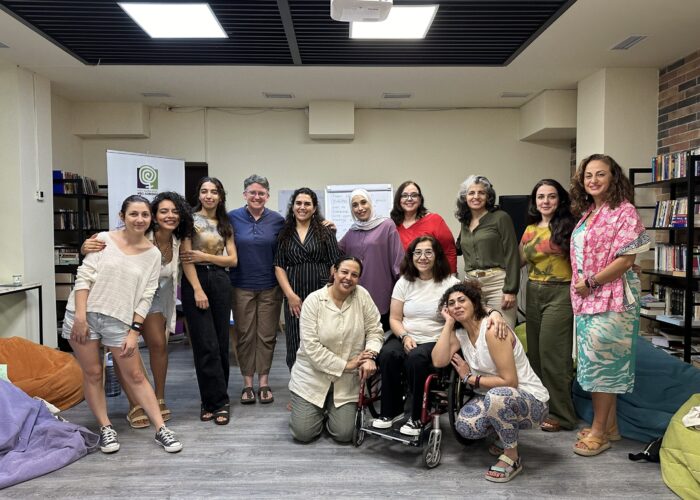 Femena participants posing for a group photo at the Yara WHRD Center