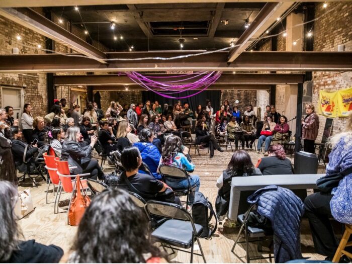 Dozens of people gather for coalition anniversary event