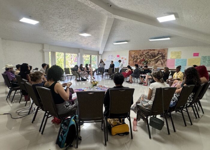 Attendees gather in a circle for Just Future's event